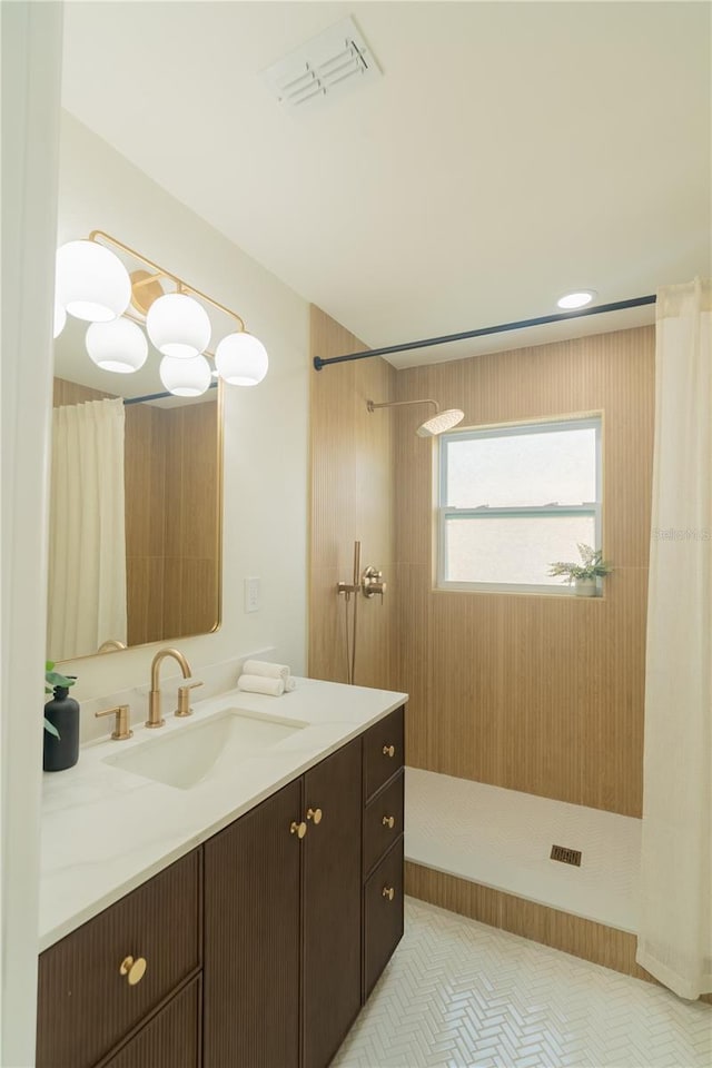 bathroom with vanity, tile patterned flooring, and a shower with shower curtain