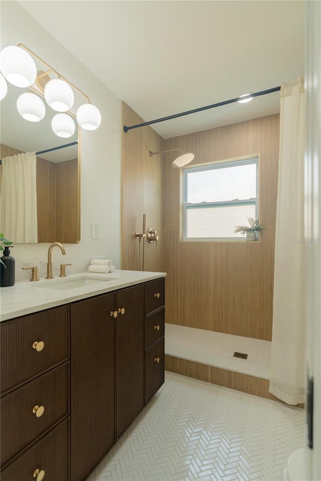 bathroom featuring vanity, a shower with shower curtain, and toilet