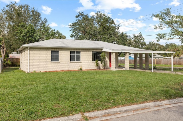 single story home with a front yard