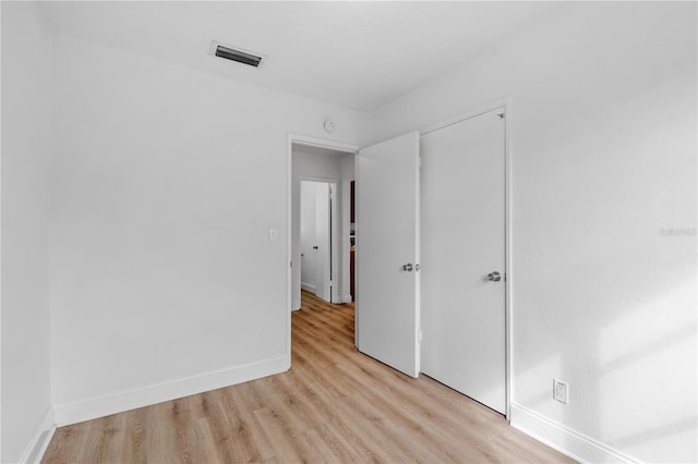 unfurnished bedroom featuring light hardwood / wood-style flooring