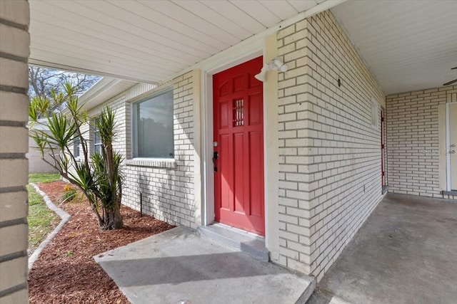 doorway to property with a porch