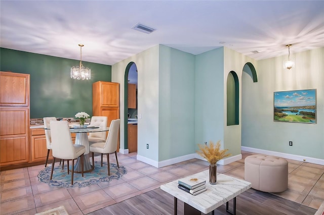 dining room featuring an inviting chandelier