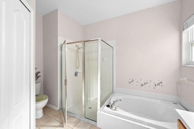 full bathroom featuring tile patterned flooring, vanity, separate shower and tub, and toilet