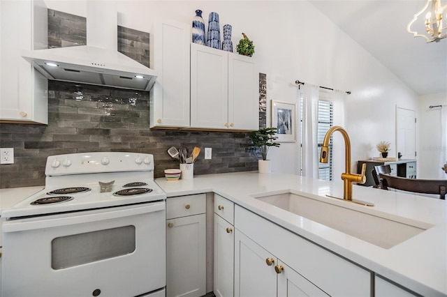 kitchen with white electric range oven, white cabinets, sink, tasteful backsplash, and exhaust hood