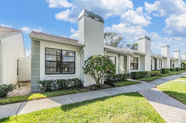 exterior space with a yard