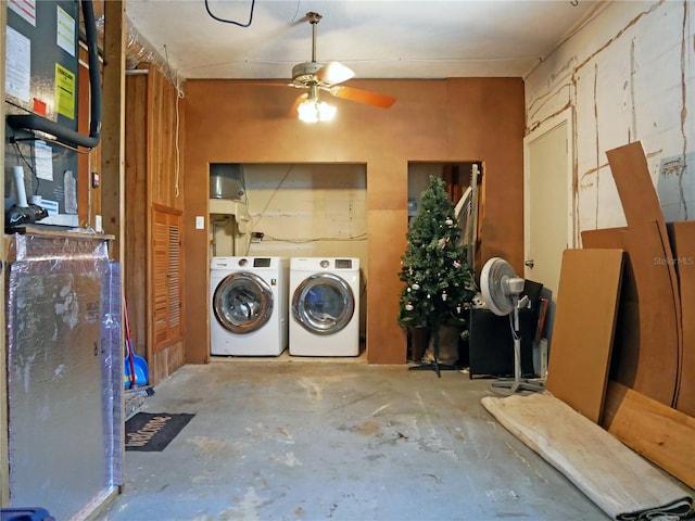 washroom featuring separate washer and dryer, ceiling fan, and heating unit