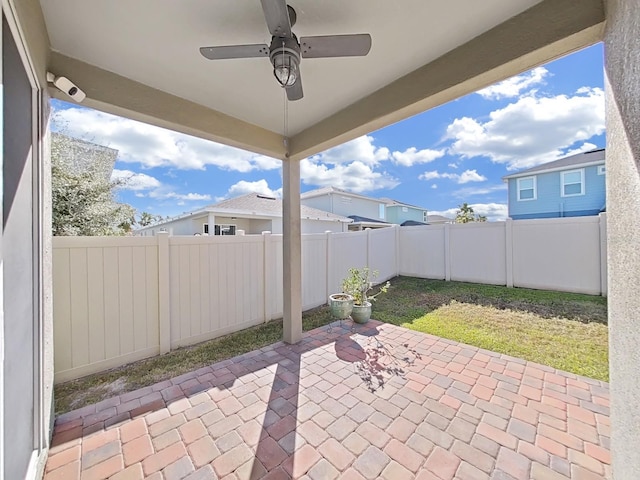 view of patio / terrace featuring ceiling fan