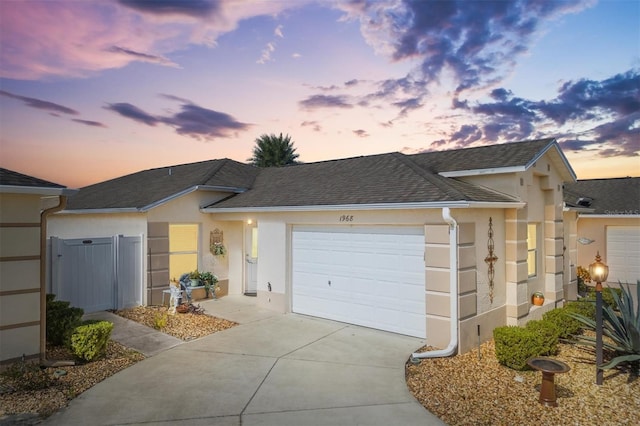 single story home with a garage