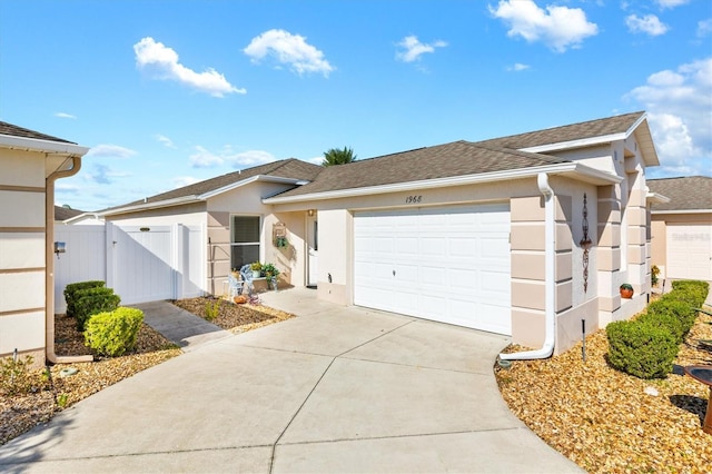 ranch-style home with a garage