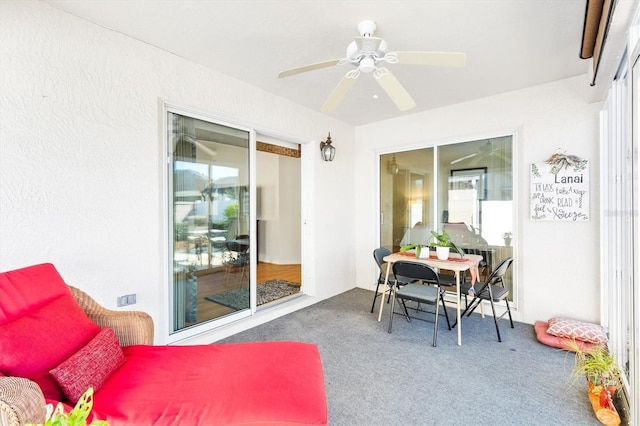 sunroom / solarium with ceiling fan