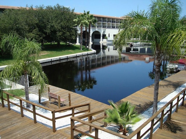 dock area with a water view