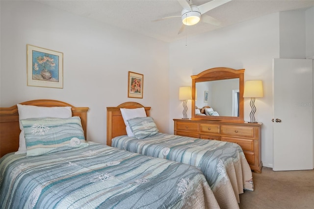 2571 Cyprus Dr Unit 1-202, Palm Harbor, FL 34684 - bedroom featuring light colored carpet and a ceiling fan
