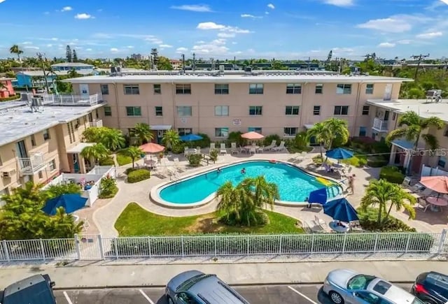 view of swimming pool with a patio area