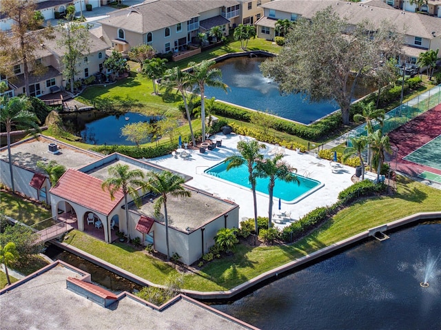 drone / aerial view with a water view