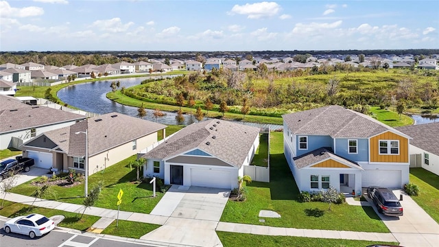 bird's eye view with a water view