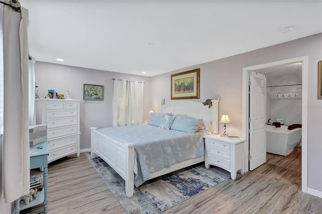 bedroom featuring light hardwood / wood-style flooring