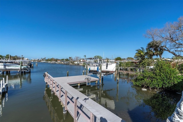 view of dock with a water view