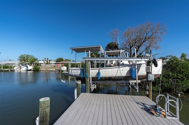 dock area featuring a water view