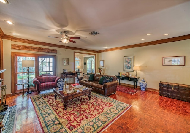 living room with parquet flooring, french doors, ornamental molding, and ceiling fan