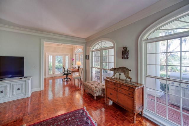 living area with french doors, parquet flooring, and ornamental molding