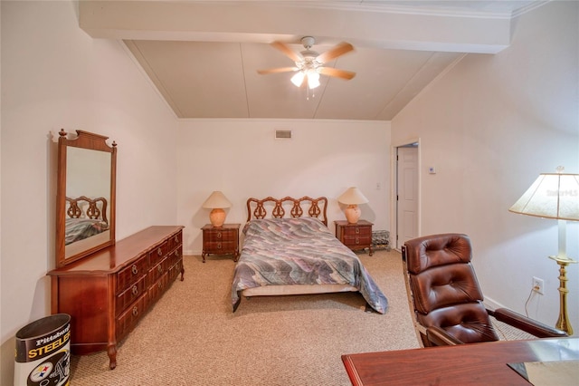 carpeted bedroom featuring ceiling fan, lofted ceiling with beams, and ornamental molding