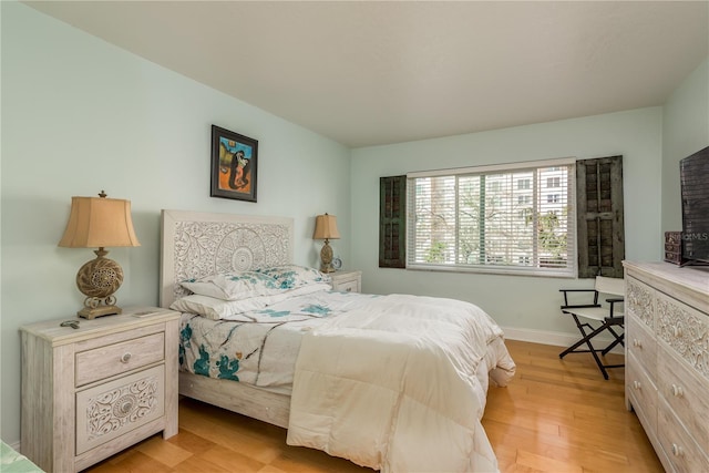 bedroom featuring light wood-type flooring