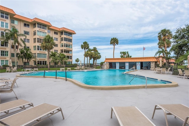 view of swimming pool with a patio area