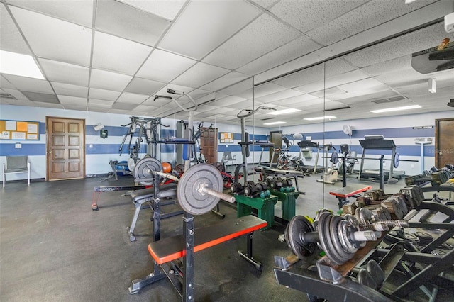 gym featuring a drop ceiling