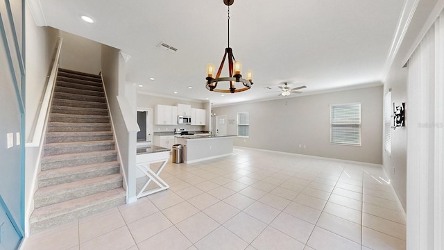 unfurnished living room featuring crown molding, ceiling fan with notable chandelier, and light tile patterned floors