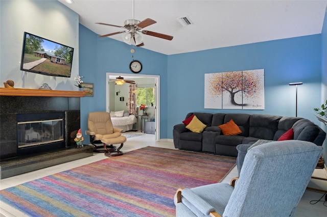 living room with high vaulted ceiling and ceiling fan