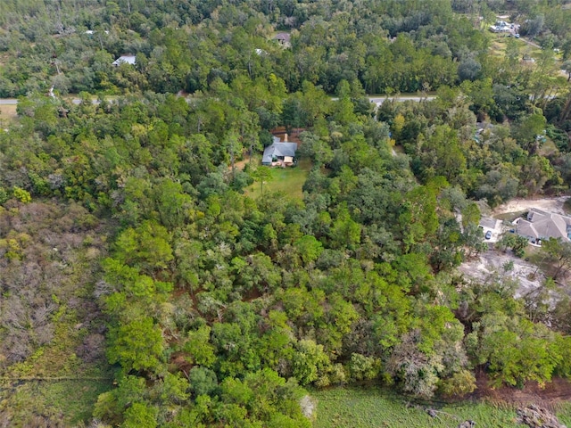 aerial view featuring a forest view
