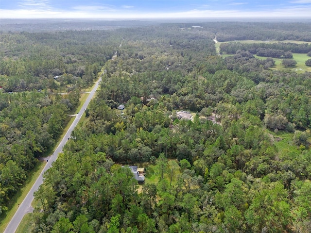 aerial view with a wooded view
