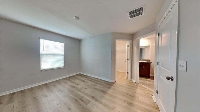 empty room featuring light wood-type flooring