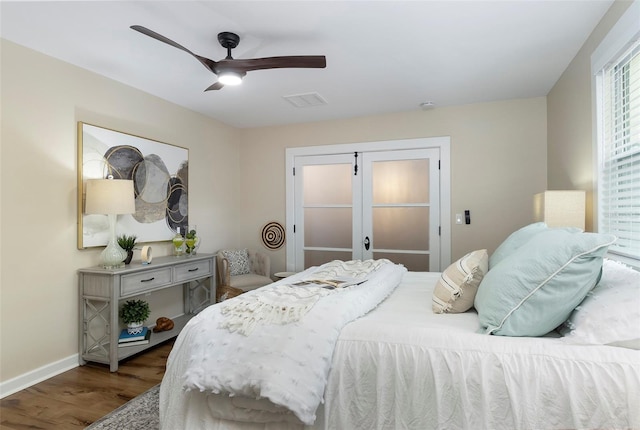 bedroom with hardwood / wood-style flooring and ceiling fan