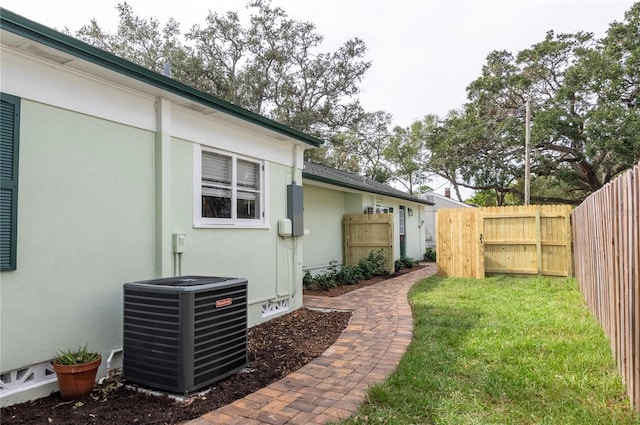 view of yard with central AC