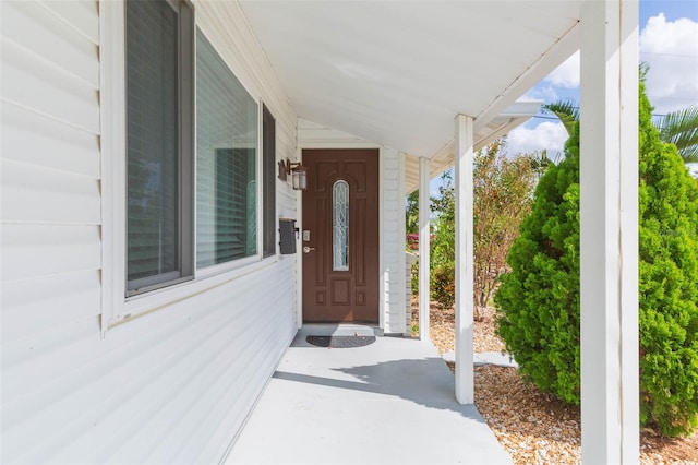 entrance to property with a porch