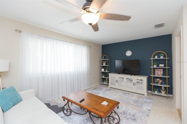 living room with ceiling fan