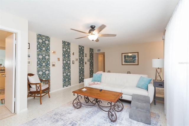 living room featuring ceiling fan