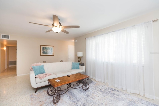 living room with ceiling fan