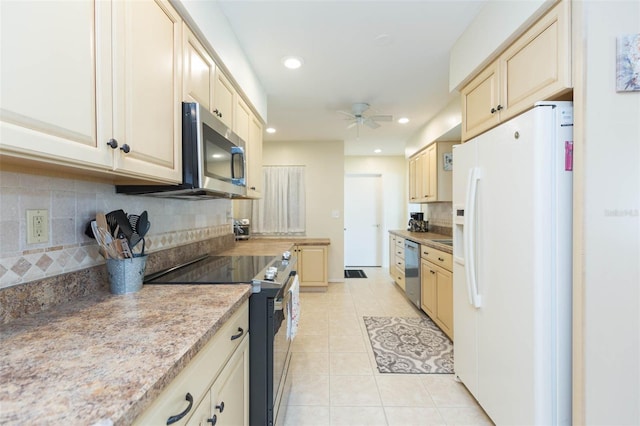 kitchen featuring tasteful backsplash, ceiling fan, stainless steel appliances, and light tile patterned floors