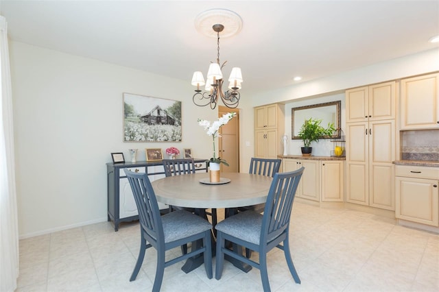 dining room featuring a notable chandelier