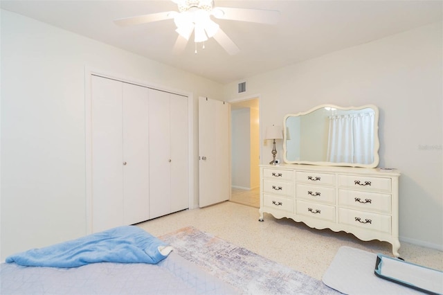 bedroom with a closet and ceiling fan