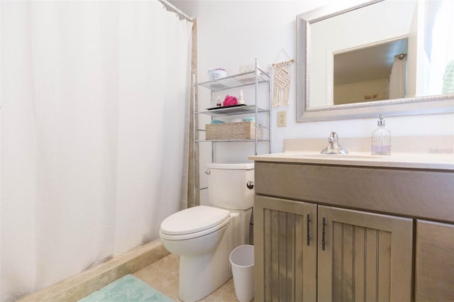 bathroom featuring vanity, a shower with shower curtain, toilet, and tile patterned floors