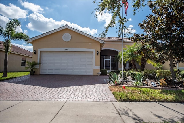 view of front of home with a garage