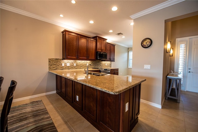 kitchen featuring kitchen peninsula, backsplash, light stone countertops, crown molding, and sink