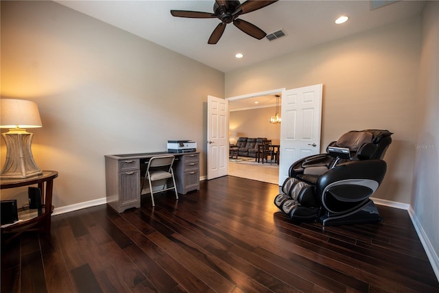 office featuring dark hardwood / wood-style floors and ceiling fan with notable chandelier