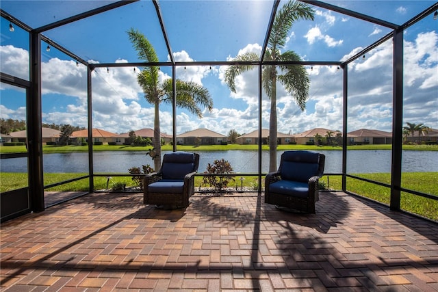 sunroom with a water view