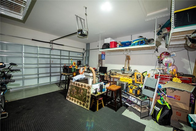 garage featuring a garage door opener