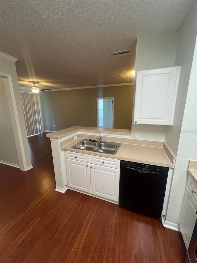 kitchen with kitchen peninsula, white cabinets, sink, and dishwasher