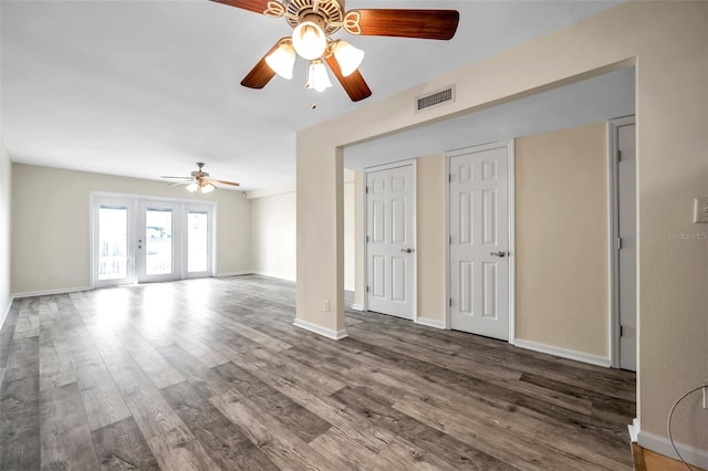 interior space featuring hardwood / wood-style flooring and ceiling fan